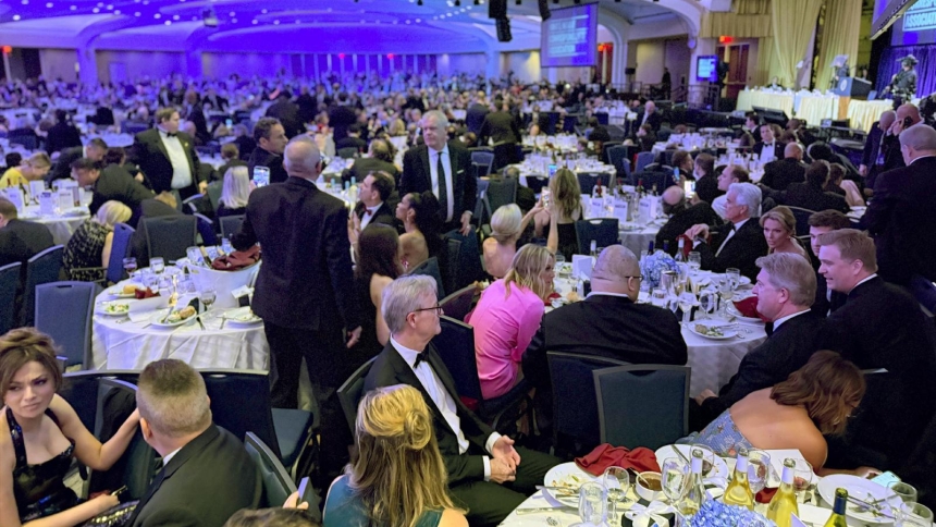 Guests watch from tables after U.S. President Donald Trump and first lady Melania Trump were rushed out of the White House Correspondents' Association dinner by Secret Service agents after gunshots were heard in Washington April 25, 2026. (OSV News photo/Jessica Koscielniak, Reuters)