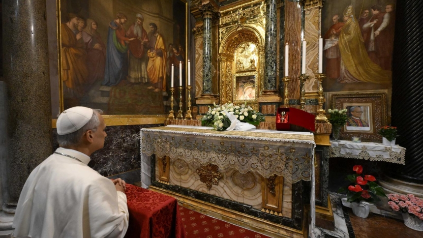 Pope Leo XIV prays in front of a fresco of Our Lady of Good Counsel at the shrine named after the image in Genazzano, Italy, southeast of Rome, May 10, 2025. In a video message released April 30, 2026, by the Pope's Worldwide Prayer Network, the pope called on Catholics worldwide to confront the problem of food insecurity with both prayer and concrete action. (CNS photo/Vatican Media)