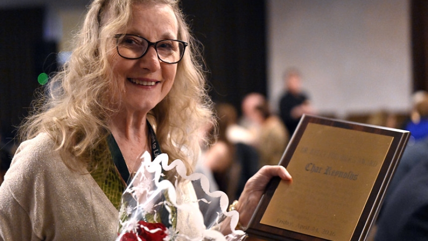 Char Reynolds, recipient of the 2026 Dr. John Kelly Founder’s Award, carries a bouquet and plaque among guests at the Lake County Right to Life banquet hosted on April 24 at Avalon Manor in Merrillville. The 53rd annual fundraising banquet featured keynote speaker Doctor George Delgado, a San Diego, California-based physician who pioneered an abortion pill reversal treatment that has saved the lives of more than 8,000 babies. (Anthony D. Alonzo photo)