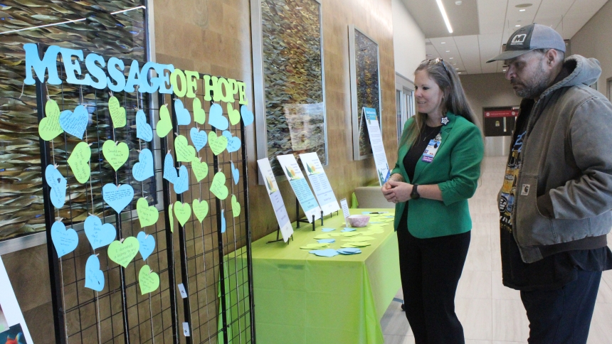 A display about organ donations was set up in the lobby of Franciscan Health Crown Point on April 21 for the annual Donate Life Celebration hosted by the hospital. Reading the Messages of Hope posted by employees and visitors are Katrina Hejnowski, chief nursing officer, and visitor Troy urtis, of Lacrosse. (Marlene A. Zloza photo)