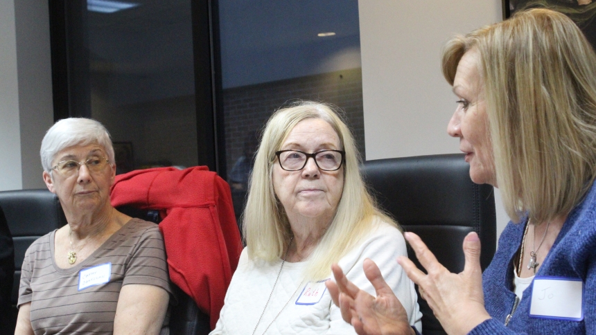 Jo Brown (right) explains to (from left) Cathy Bartczak and Ruth Palis, as well as others attending the Diocese of Gary’s semi-annual Prolife Meeting on April 13 at the Pastoral Center in Merrillville, how the Walking With Mothers in Need group at St. Michael the Archangel in Schererville was recently able to help its first mother in need with diapers and other baby needs after she reached out to the group. “She’s the first mom who saw our sign in the church’s gathering place and called us,” said Brown. “We