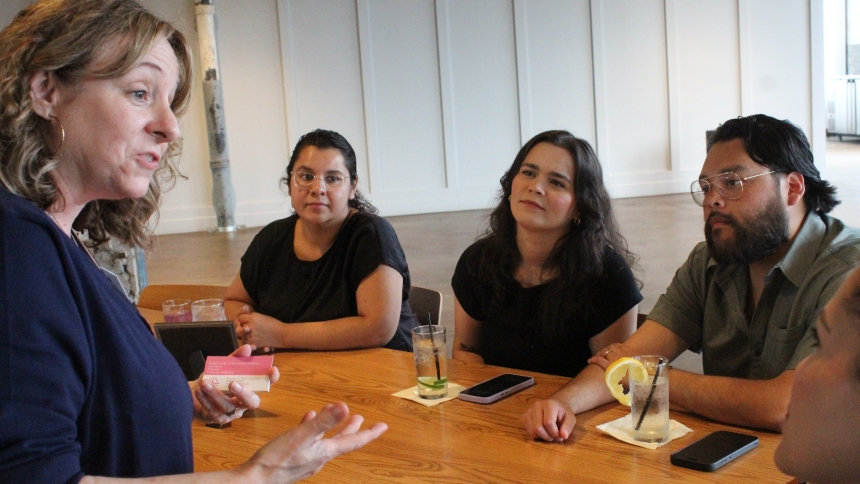 Kristine Coronado ( from left) , co-executive director for Right to Life of Northwest Indiana, explains the work of her organization in Porter and LaPorte counties, to Stephanie Valdovinos, of Valparaiso, and Destinie and Jose Alcantar, of Chesterton, guests at the “Evangelizing Reality: Science & the Culture of Life” program at Journeyman Distillery in Valparaiso on April 15. Both Valdovinos and Destinie Alcantar are registered nurses at Franciscan Health Michigan City who came at the invitation of speaker