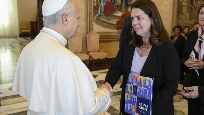 Pope Leo XIV greets Kerry Alys Robinson, president and CEO of Catholic Charities USA, as he meets with the agency's directors May 4, 2026, in the Consistory Hall of the Apostolic Palace at the Vatican. (OSV News photo/Mario Tomassetti, Vatican Media)