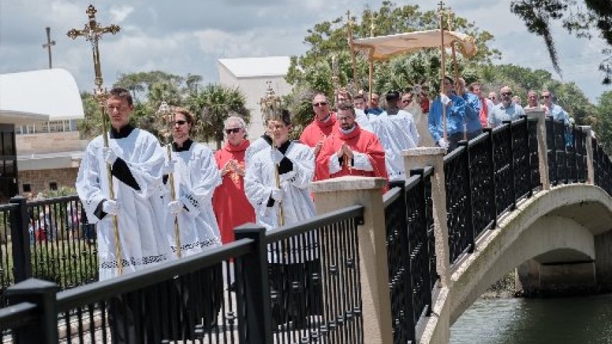 Bishop Erik T. Pohlmeier of St. Augustine, Fla., carries the Monstrance on his way to the Historic Chapel on the grounds of Our Lady of La Leche Shrine during the kickoff of the 2026 National Eucharistic Pilgrimage in St. Augustine May 24. (OSV News photo/George Martell)