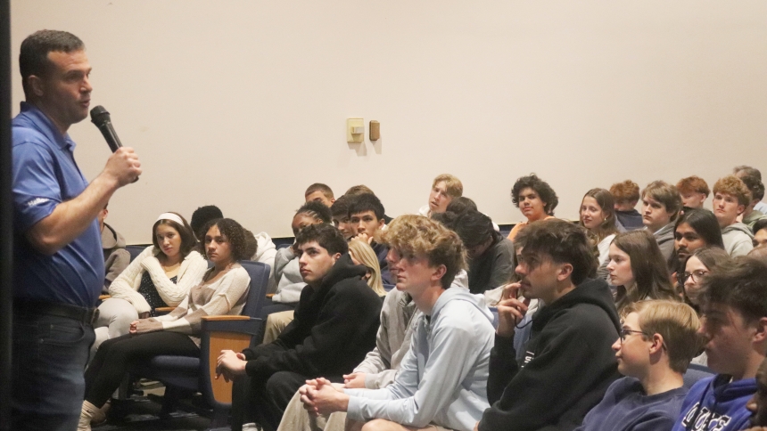 Hallow representative talks with students