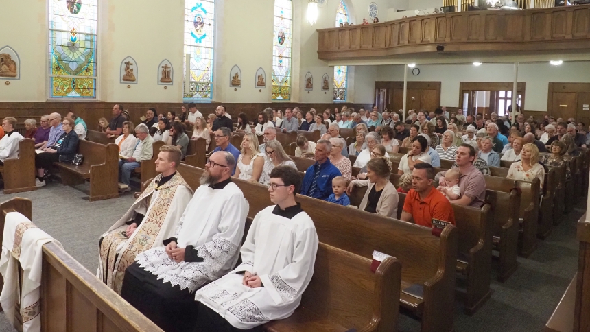 People from throughout northwest Indiana gather to pray during a Holy Hour for LaPorte County deputy Jon Samuelson on May 26 at St. Joseph Catholic Church. (Michael Wellinski photo) 