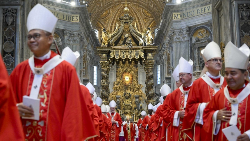 Prelates process after Pope Leo XIV celebrated Mass with the blessing and imposition of the pallium on new metropolitan archbishops on the feast of Sts. Peter and Paul in St. Peter's Basilica at the Vatican June 29, 2026. (OSV News photo/Simone Risoluti, Vatican Media)