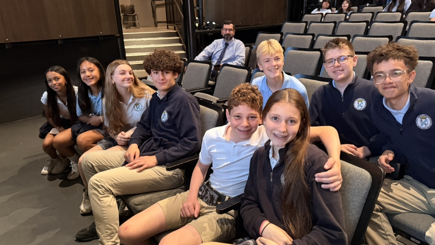 St. Mary Catholic Community School eighth graders in Deborah Shea’s class in Crown Point, top investors in the Big Shoulders Fund Stock Market Program that involved 63 schools in the Diocese of Gary and Archdiocese of Chicago, await the start of a capstone award ceremony last month at Harris Theater in Chicago. (Provided photo)