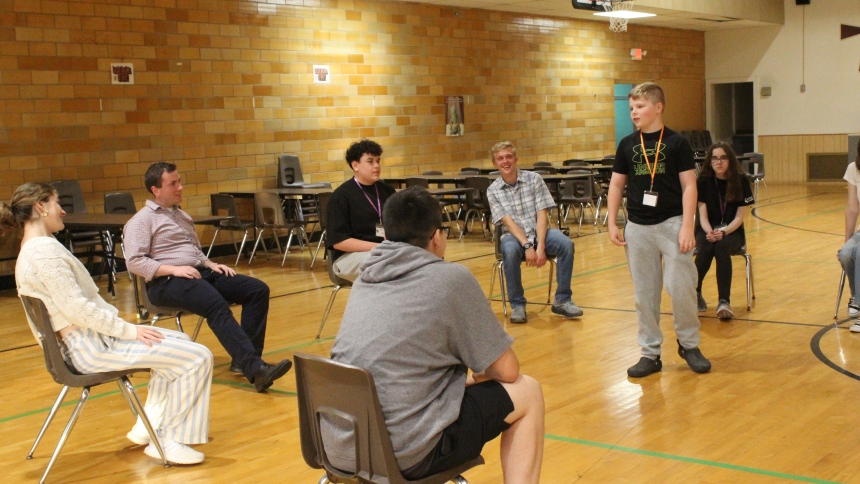 Seventh grader Charlie True (standing) gets ready to lead fellow Totus Tuus participants and missionaries in a round of “I’ve Got Mail”  during an opening games session at St. Patrick in Chesterton on June 22. Junior and senior high students met for five evenings, June 21-25, for lessons on the Ten Commandments, small group discussions, games and snacks, and a closing Night Prayer in the chapel on campus, while youngsters in grades 1-6 met with the same team of missionaries on June 22-26. This week, the Dio