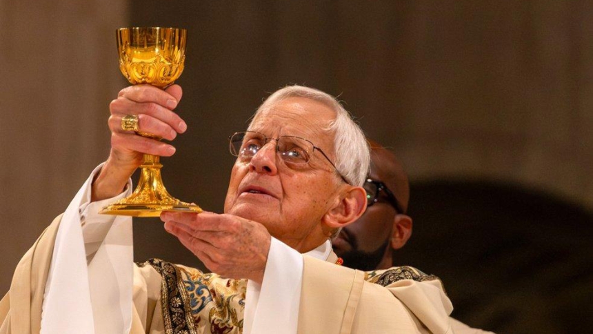 Cardinal Donald W. Wuerl, retired archbishop of Washington, raises the chalice as he concelebrates a Mass of thanksgiving for America’s 250th Anniversary at the Basilica of the National Shrine of the Immaculate Conception in Washington July 4, 2026. (OSV News photo/Tim Dias, courtesy National Shrine of the Immaculate Conception)