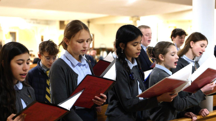 Students are seen in a Jan. 21, 2026, photo, singing during Mass at Regina Pacis Academy in Norwalk, Conn. Regina Pacis Academy, a preschool-to-eighth-grade independent Catholic school, was founded as a tech-free classical school. Instead of smartboards, devices and a computer lab, the academy has chalkboards, textbooks and a well-stocked library, said Kimberly Quatela, its principal. (OSV News photo/courtesy Regina Pacis Academy)