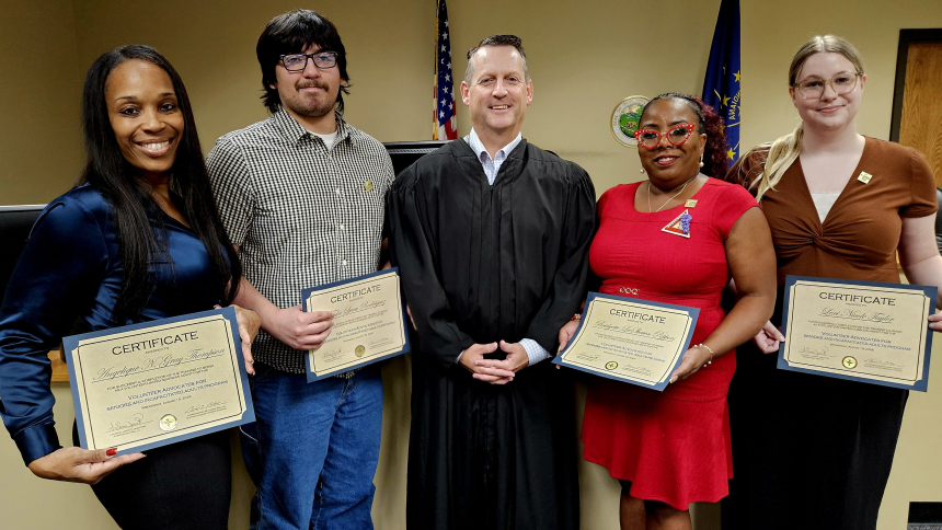 New Franciscan VASIA volunteers sworn in earlier this month seen here with Lake Superior Court Probate Commissioner Ben Ballou (center) are (l-r) Angelique N. Gray Thompson of Gary, Tyler Lucas Rodriguez of Schererville, Bridgette LaShawn Peppers of Hobart and Lexi Nicole Taylor of Orland Park, Ill. 