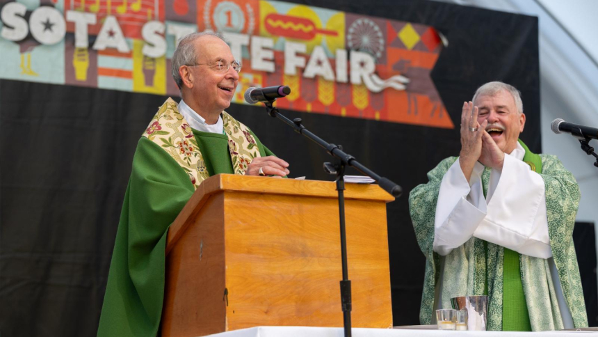 Baltimore Archbishop William E. Lori greets people gathered for Mass Aug. 30, 2026, at the Minnesota State Fair in Falcon Heights. Concelebrating was Father Robert Fitzpatrick, a retired priest of the Archdiocese of St. Paul and Minneapolis and former pastor of Corpus Christi in Roseville, who has celebrated state fair Masses since 2014. (OSV News photo/Dave Hrbacek, The Catholic Spirit)
