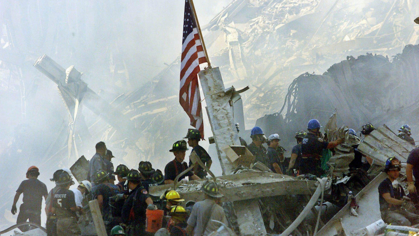 A U.S. flag is posted in the rubble of the World Trade Center Sept. 13, 2001, in New York, two days after the terrorist attacks. Sept. 11 this year marks the the 10th anniversary of the attacks that claimed the lives of nearly 3,000 people in New York City and Shanksville, Pa., and at the Pentagon. (OSV News photo/Beth Kaiser, Reuters)