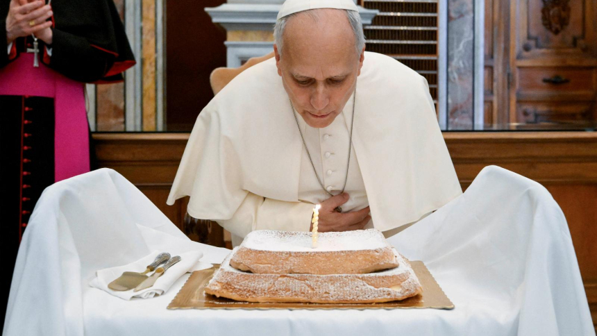 Pope Leo XIV blows out a candle as he receives an angel cake from Vatican employees to mark his 71st birthday during his visit to inaugurate the exhibition "AQVA. Catastrophe and Wonder” at the Vatican Library Sept. 14, 2026. As the first U.S.-born pope marks his birthday, a Catholic scholar told OSV News he sees a potential shift toward "more hopeful perceptions of and associations with Catholicism" now than in the past two decades because of Pope Leo's priorities and his Americanism. (OSV News photo/Simon