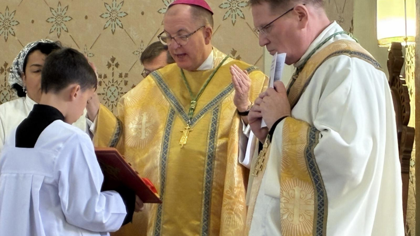 Bishop John O. Barres of Rockville Centre (center), chairman of the board of directors of The Pontifical Mission Societies, U.S.A., celebrates Mass at St. Mary's Church in El Paso, Ill., Sept. 26, 2026, with Bishop Louis Tylka of Peoria. Blessed Fulton J. Sheen was baptized at St. Mary's on May 12, 1895, and Bishop Barres was baptized by Blessed Sheen decades later in New York. (OSV News photo/Gretchen R. Crowe)