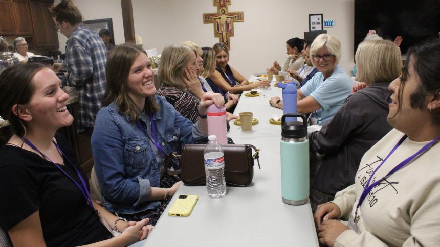 All ages of women are participating in the new, nine-week program, “She Shall Be Called Woman” that began on Sept. 14 at St. John the Evangelist in St. John. Among the young adults who shared snacks and fellowship before the first video and small group discussion are (from left) Regina Puch of St. John, her sibling Mary Rose Gianotti of Beecher, Ill. and Yesenia Lopez of Lansing, Ill. (Marlene A. Zloza photo)