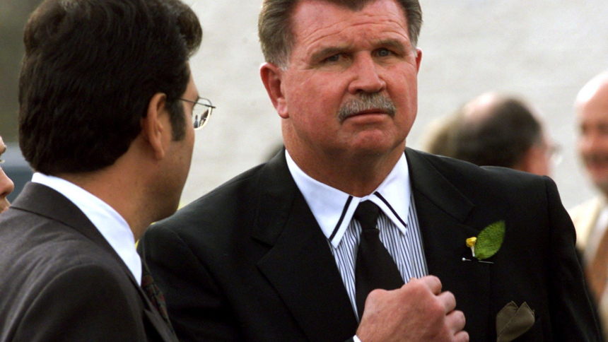 In this file photo former Chicago Bears coach Mike Ditka pauses to talk with the media following a private memorial service for the late Chicago Bears running back Walter Payton at Life Changers Church in the Chicago suburb of Barrington, Ill., Nov. 5, 1999. Ditka, who was open about his Catholic faith, died on Oct. 9, 2026, at 86. (OSV News photo/Sue Ogrocki, Reuters Files)