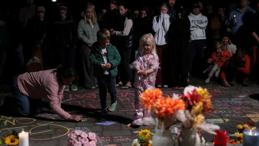 People take part in a candlelight vigil at Drake Park for victims of the Silver Rail Elementary School shooting, in Bend, Ore., Oct. 15, 2026. A 16-year-old opened fire at the elementary school killing at least three children and a teacher before he was shot by a person at the scene who pursued him into the school, authorities said. (OSV News photo/Rob Kerr, Reuters)