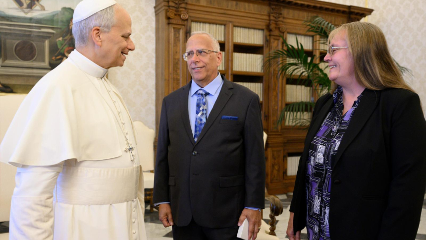 Pope Leo XIV speaks with his brother Louis Prevost and sister-in-law Deborah Prevost in the papal library of the Apostolic Palace at the Vatican May 19, 2025. Louis Prevost, a current cancer patient, spoke with OSV News Oct. 16, 2026, about his own experience battling cancer strengthened by faith and prayer following the news his brother, Pope Leo, has lung cancer. (CNS photo/Vatican Media)