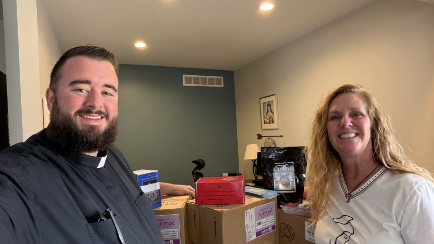 Father Jacob McDaniel and Allison Maciejewski