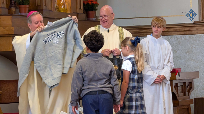 Bishop McClory receives gift from St. Mary students