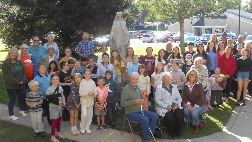 Religious education students, staff and families joined members of the Altar and Rosary Society at the grotto at the front of St. Mary church in Otis to pray the Rosary on Oct. 4. During this Month of the Holy Rosary, they will gather again at 3:15 p.m. on Saturday, Oct. 17 to pray the Rosary before the 4 p.m. Mass, followed by a reception with appetizers. (Provided photo)