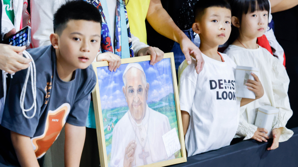 Children wait to see Pope Francis as he arrives at the Steppe Arena to celebrate Mass in Ulaanbaatar, Mongolia, Sept. 3, 2023. (CNS photo/Lola Gomez)